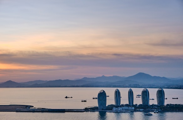 a large body of water surrounded by tall buildings