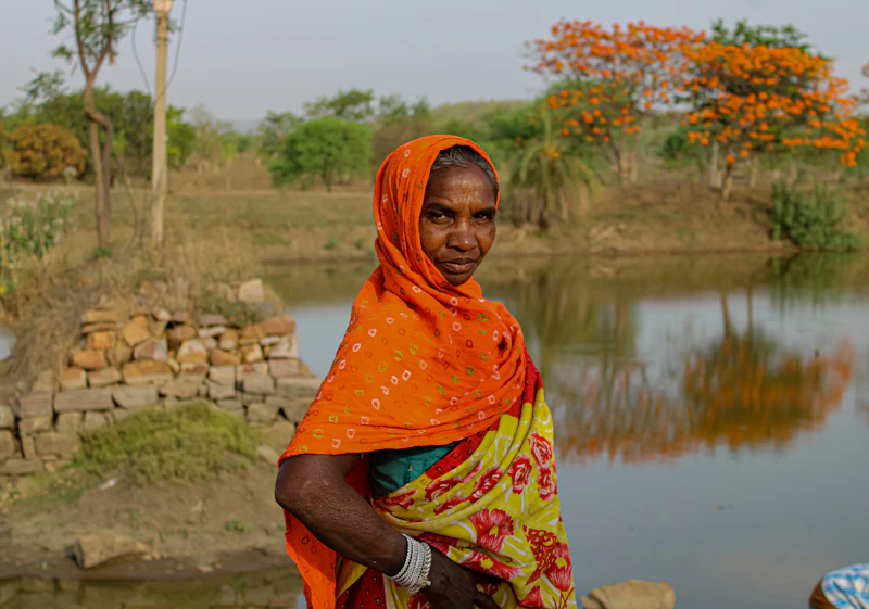 Serene Indian woman, potential sugar momma, by the water