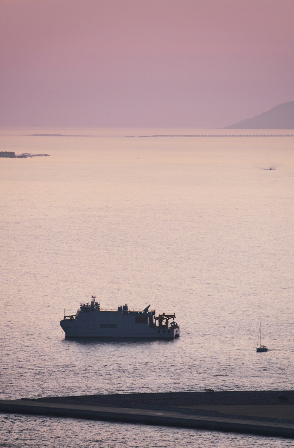 a large boat floating on top of a large body of water