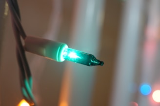A close-up of a stylish energy-efficient gadget with a soft glow in a cozy setting.