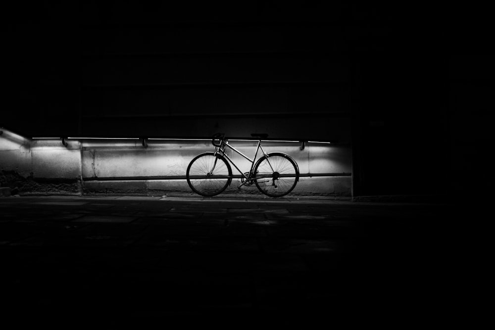 a bike parked in a dark parking garage