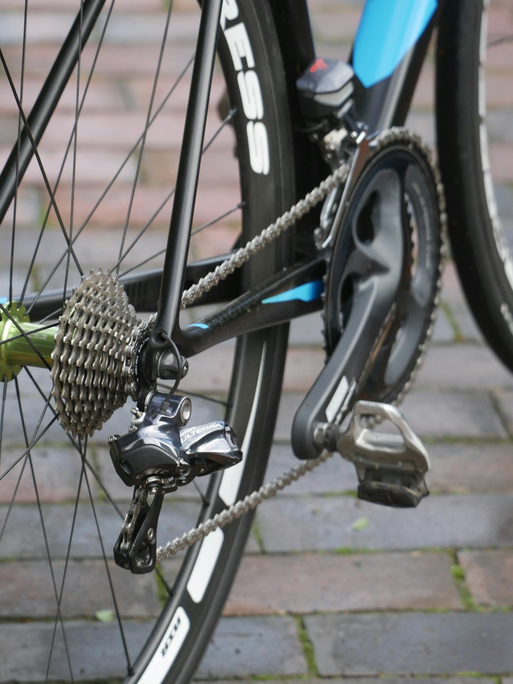 a close up of a bike with a chain on it