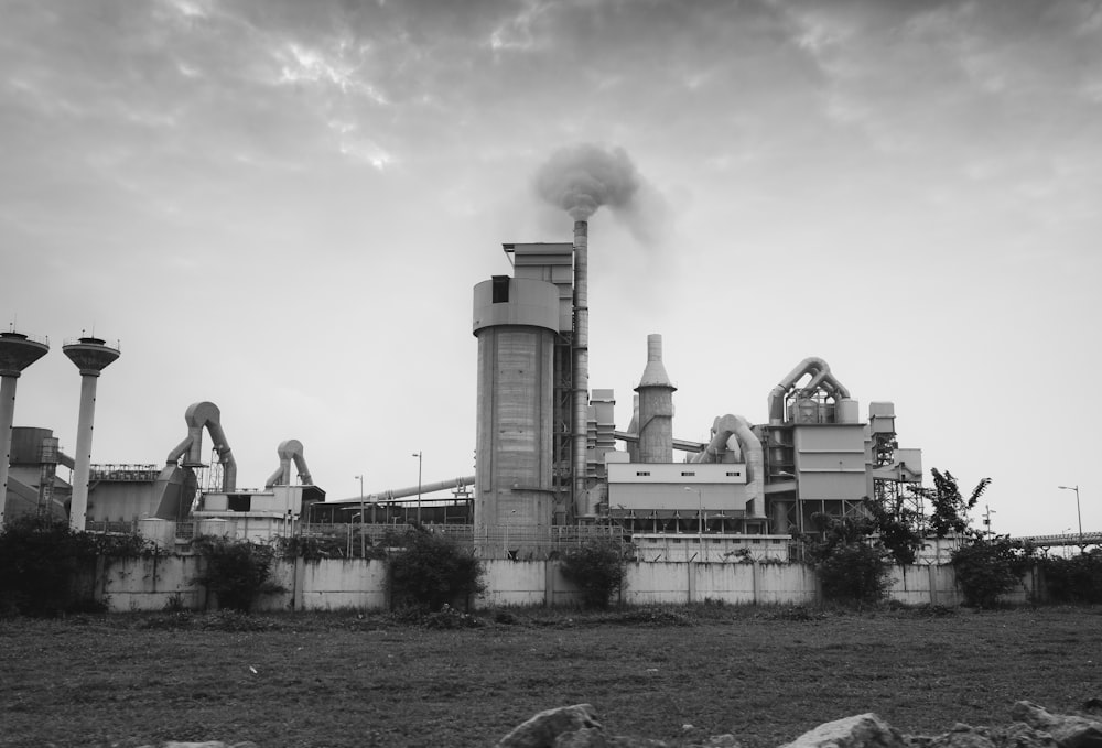 a black and white photo of a factory