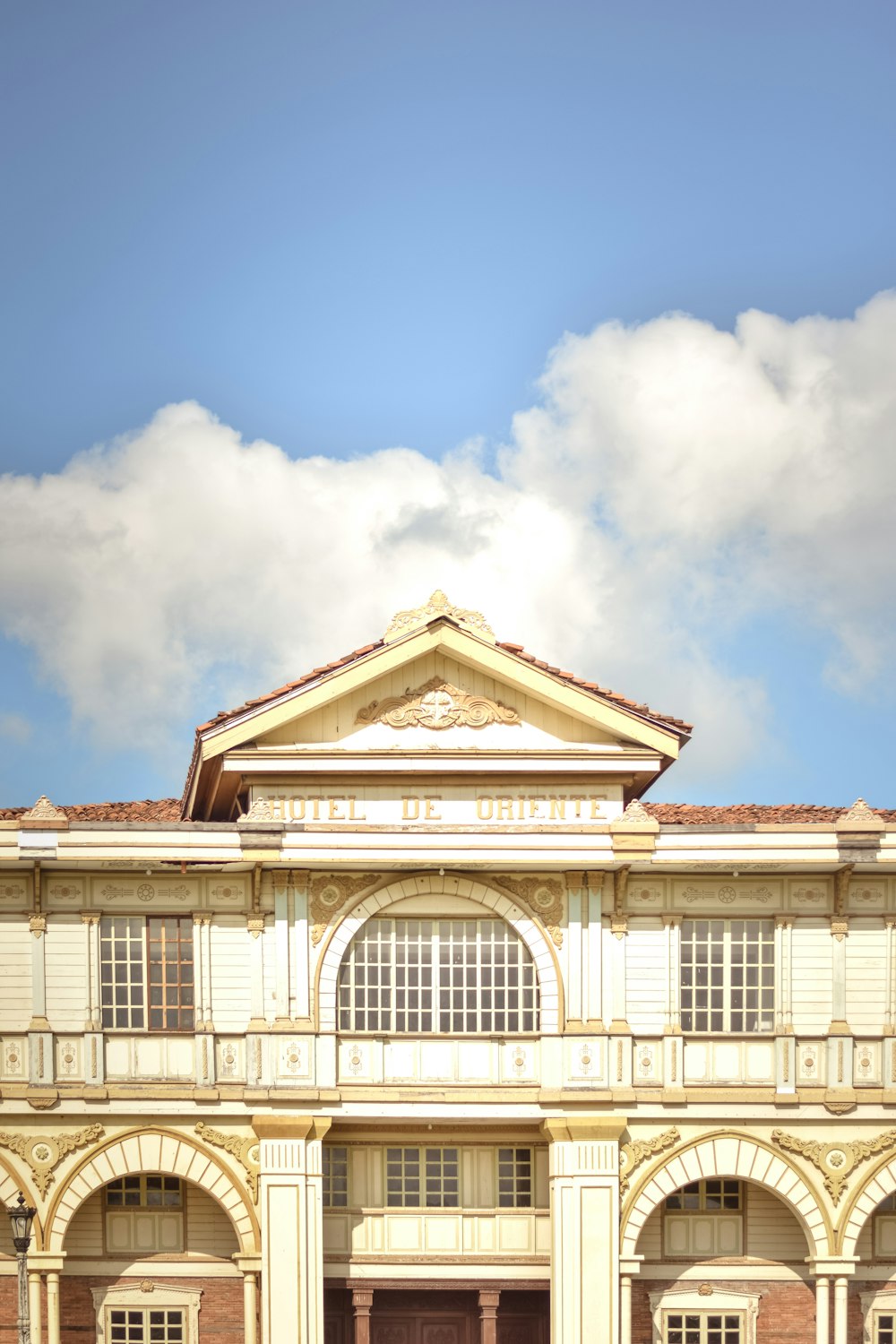 a large building with a clock on the top of it