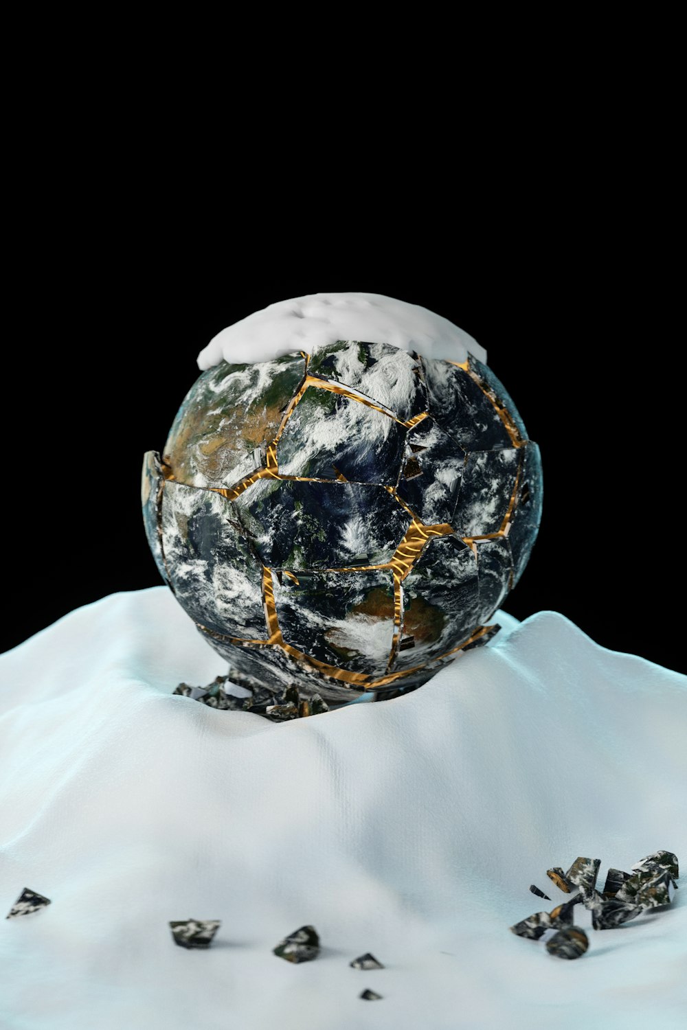 a snow covered earth with a black background