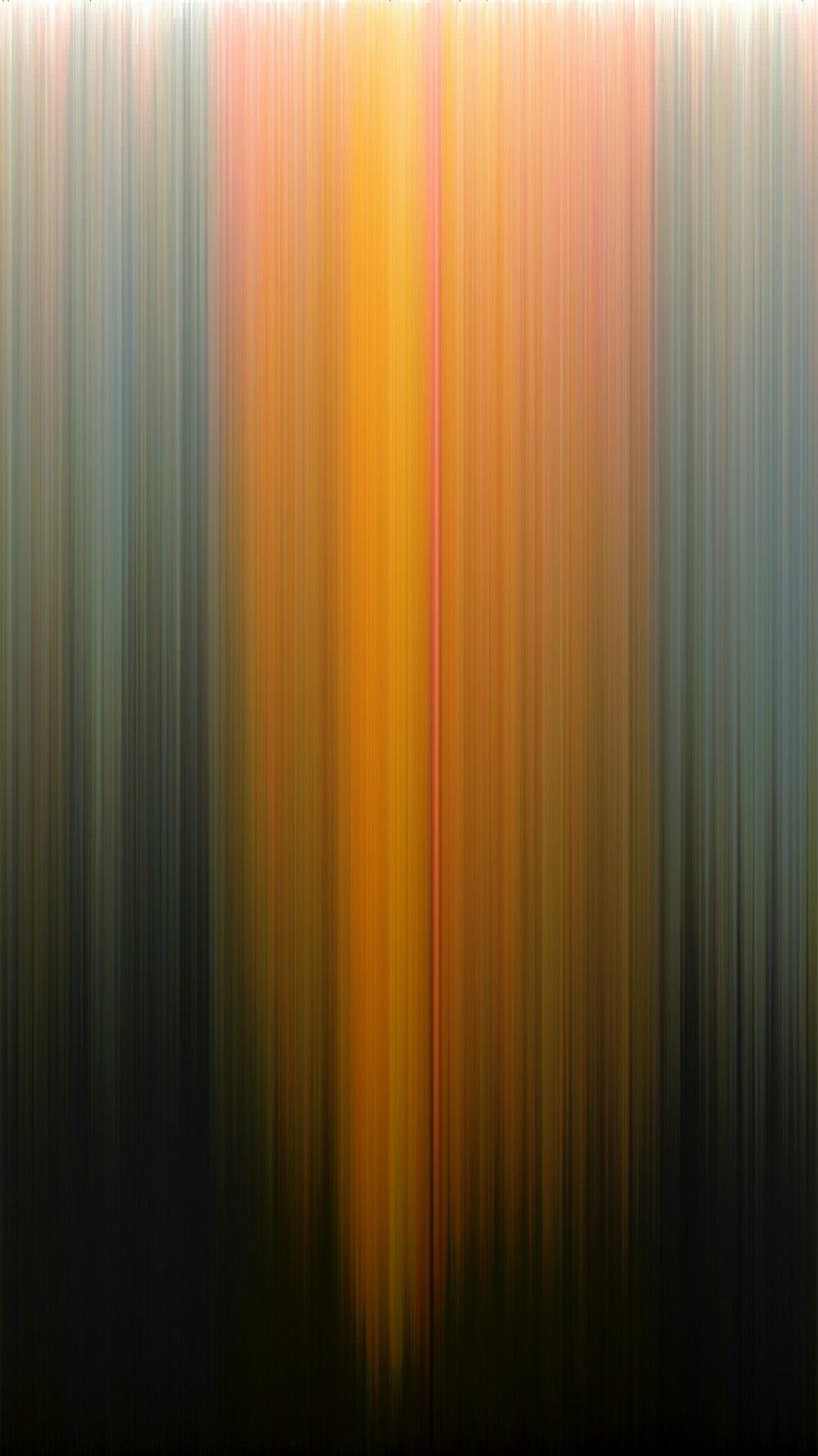 a blurry image of yellow and orange lines