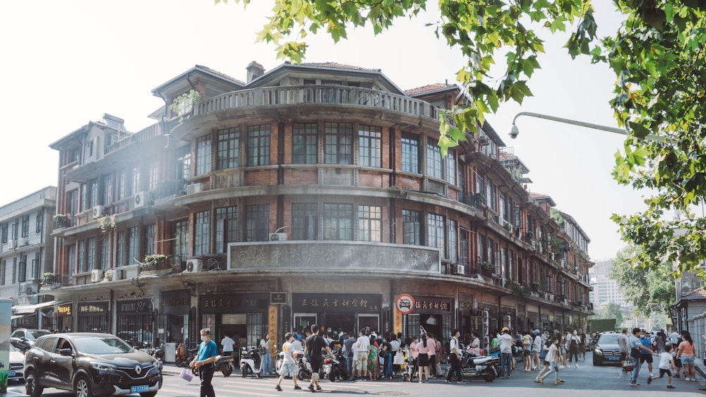 a large group of people walking down a street