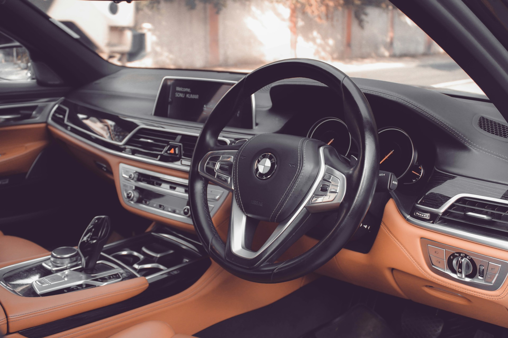 the interior of a car with a dashboard and steering wheel