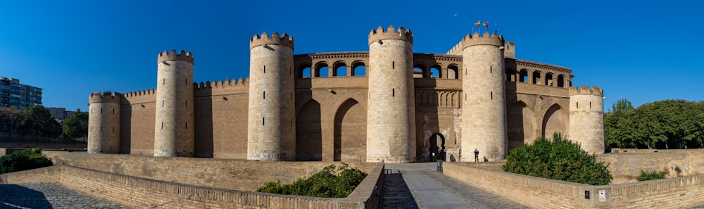 a castle like structure with a walkway leading to it