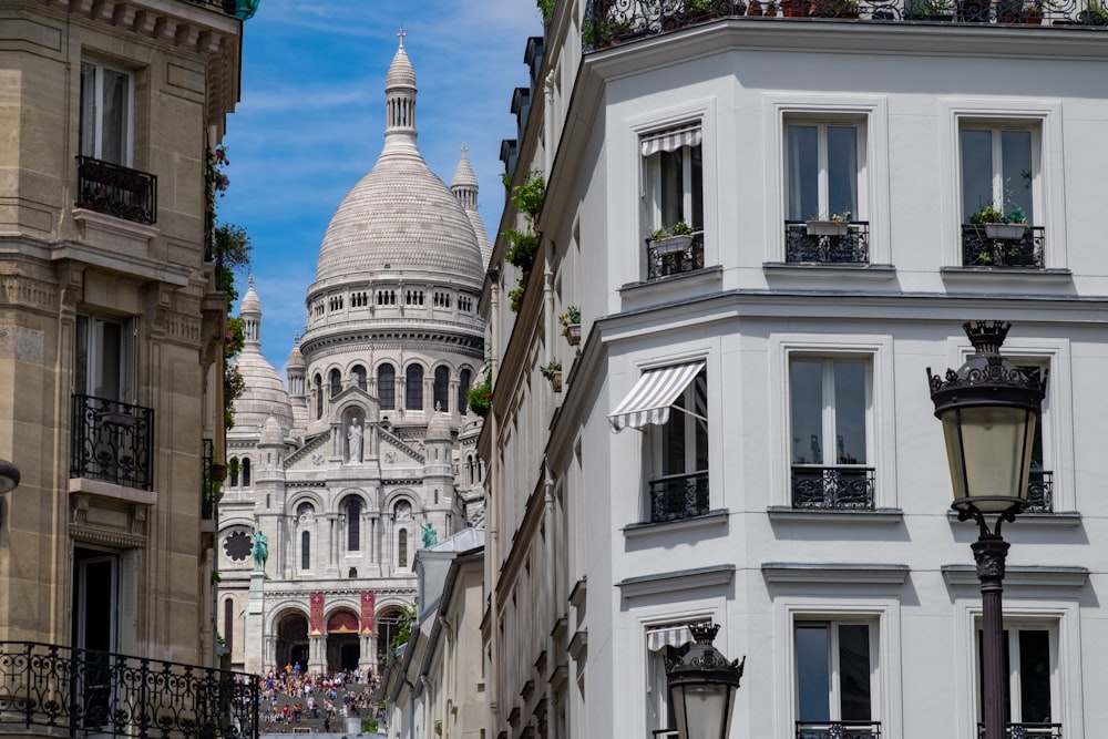 a view of a building with a dome in the background