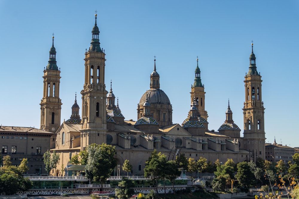 a large building with two towers and a clock tower