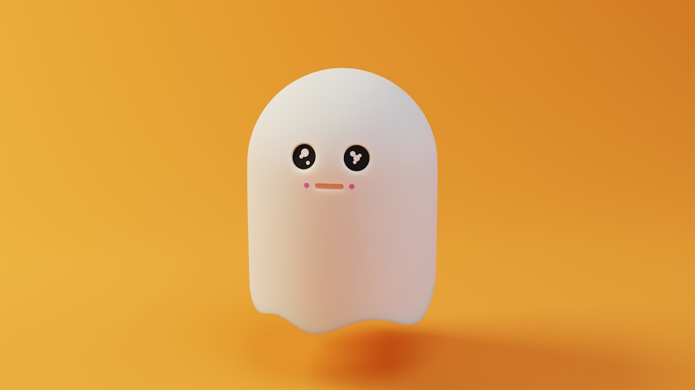 a white object with eyes and a nose on an orange background