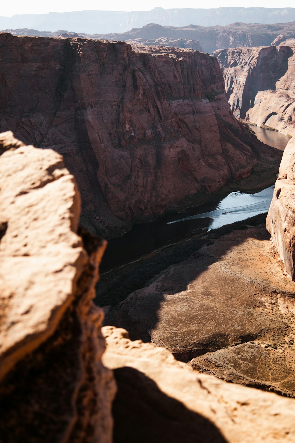 a view of a river in the middle of a canyon