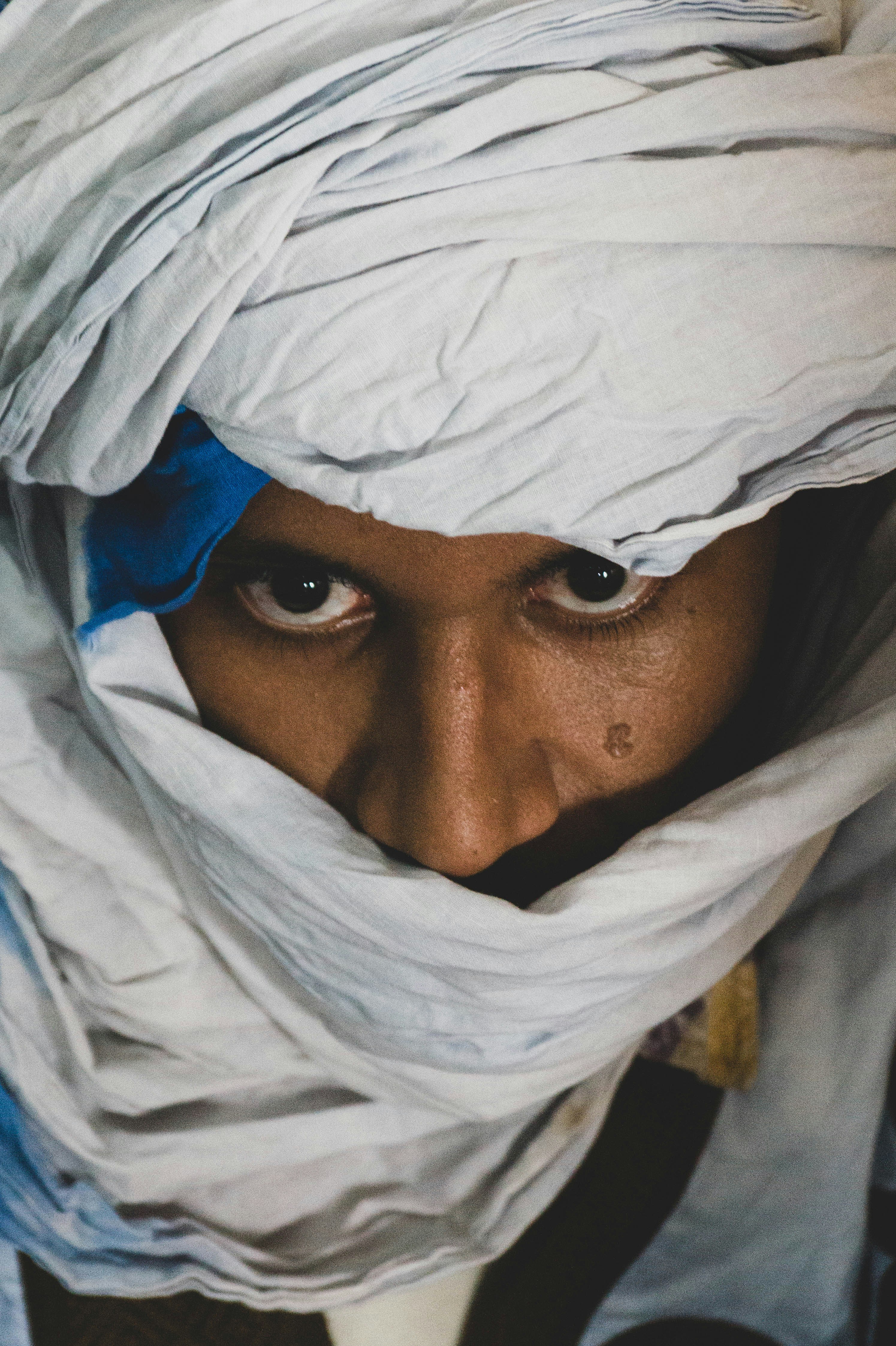 A woman with a white head covering her face photo – Free Sahara desert