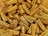 a pile of gold colored objects on a table