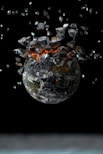 a picture of a planet with a lot of debris around it