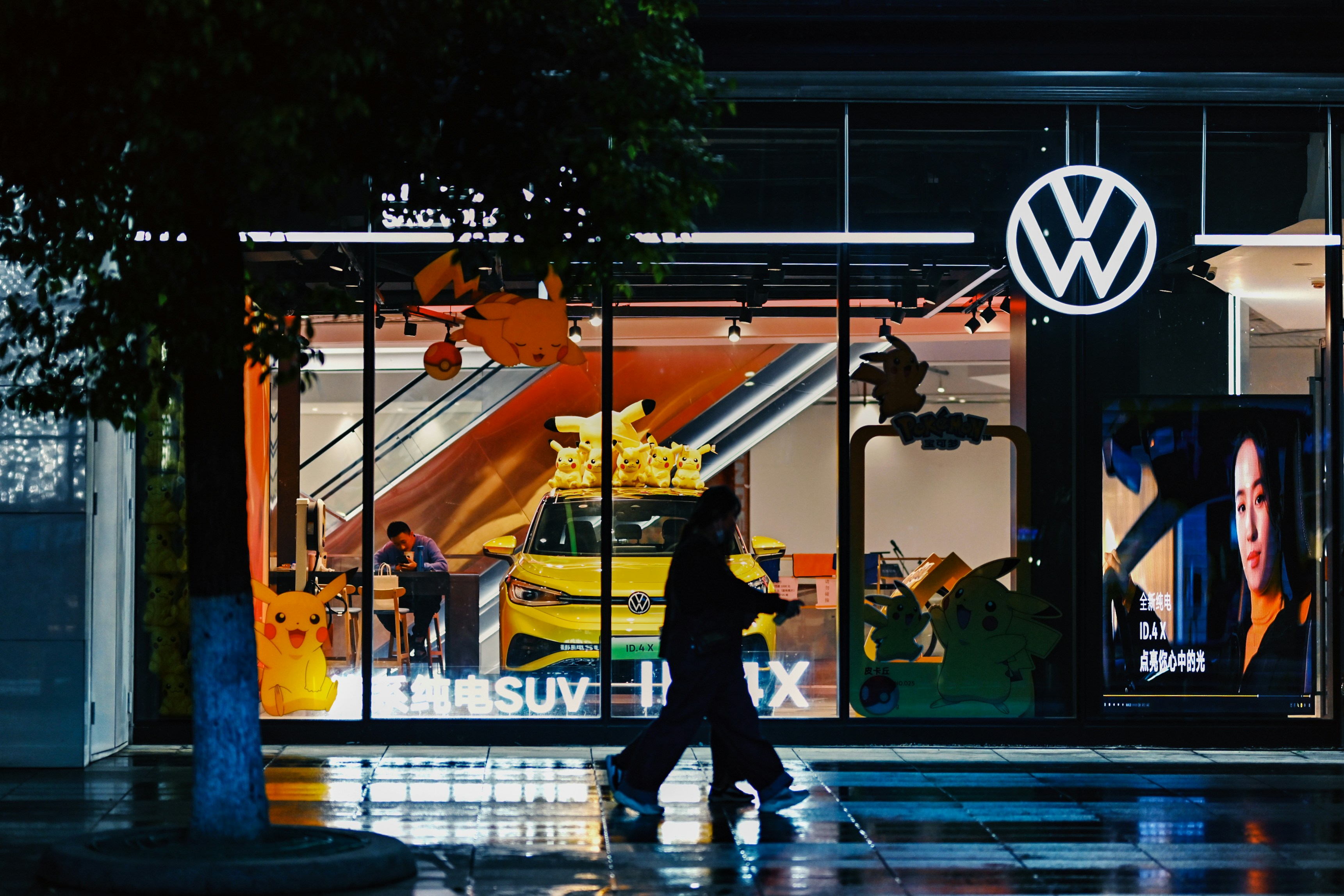 a group of people walking down the street