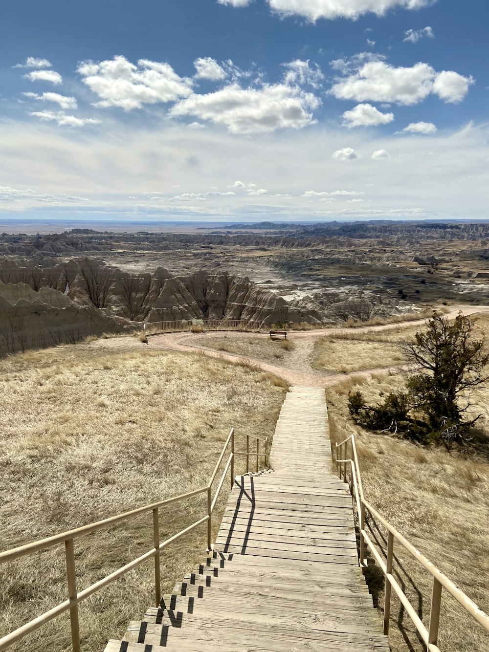 a set of stairs leading to a scenic view