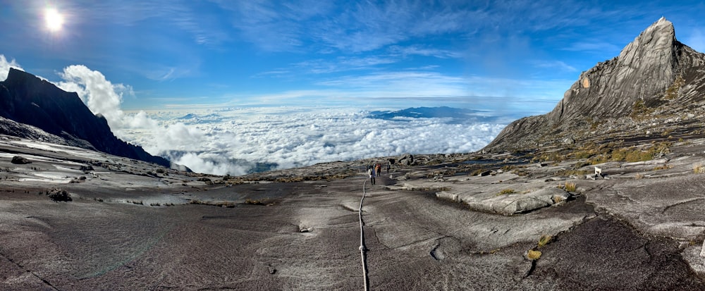 a view of a mountain with a sky background