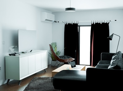 A cozy living room featuring a modern air conditioning system.