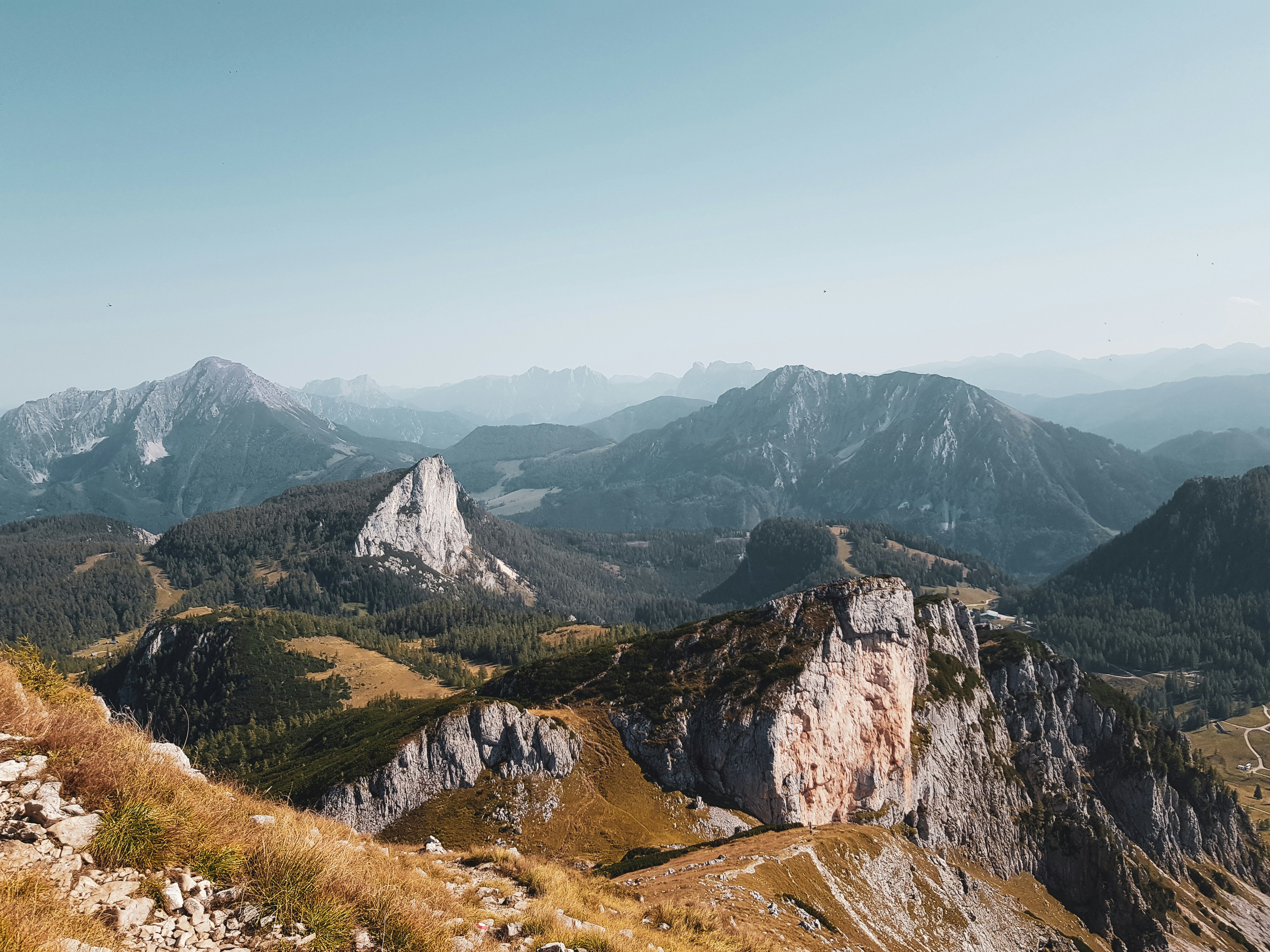 a view of a mountain range with mountains in the background