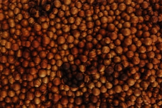 a large pile of nuts sitting on top of a table