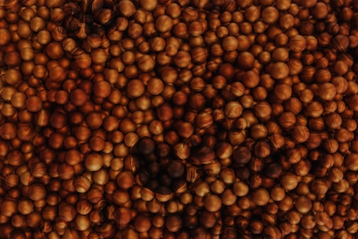 a large pile of nuts sitting on top of a table