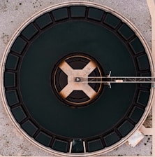 an overhead view of a circular metal structure