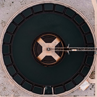 an overhead view of a circular metal structure