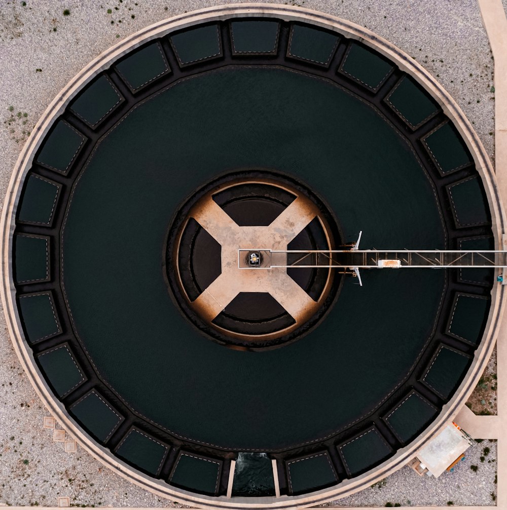 an overhead view of a circular metal structure