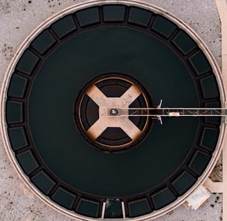 an overhead view of a circular metal structure
