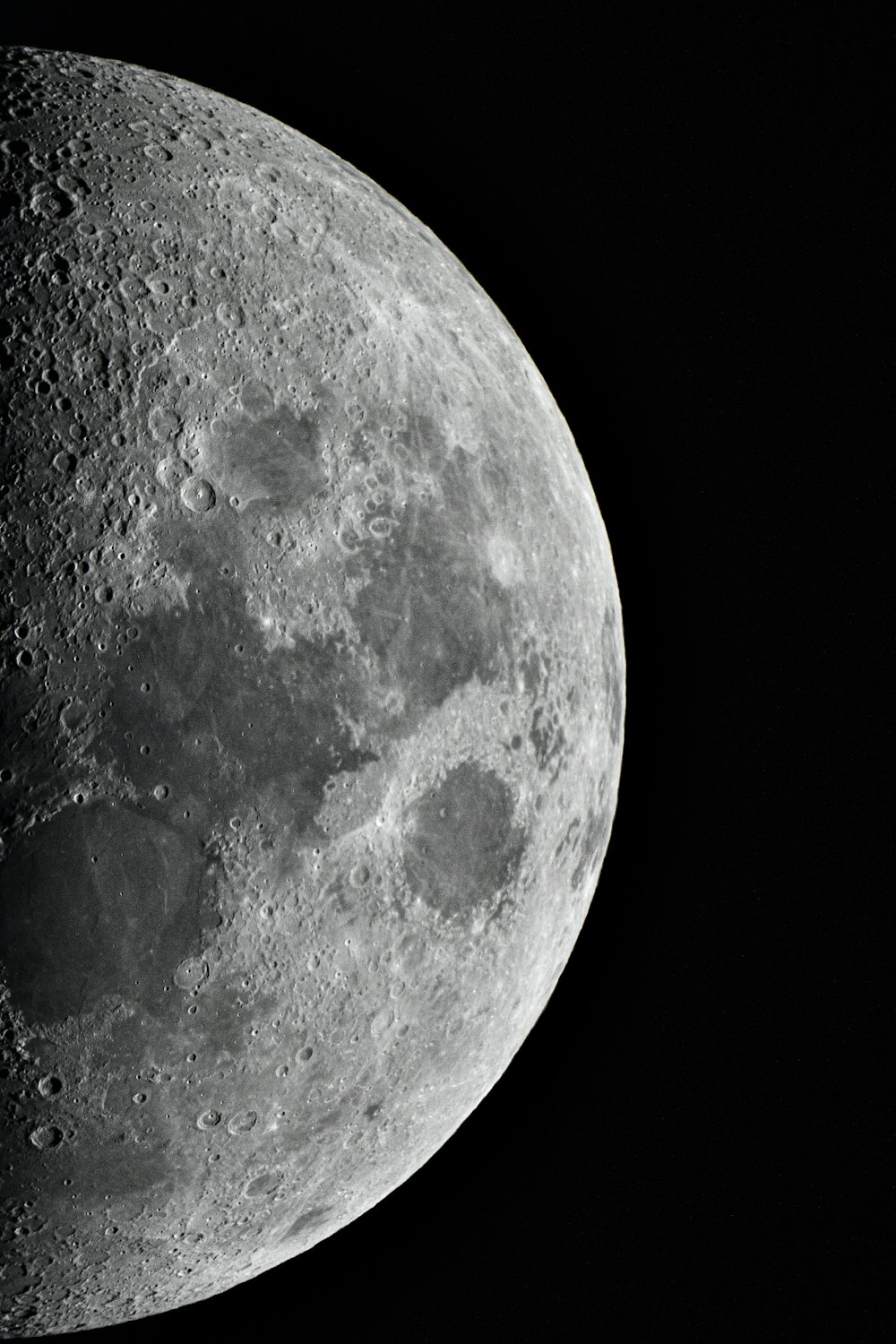 a close up of the moon with a black background