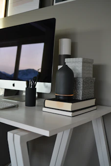 a desktop computer sitting on top of a white desk