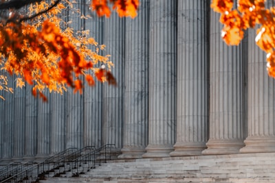 a building with columns and steps in front of it