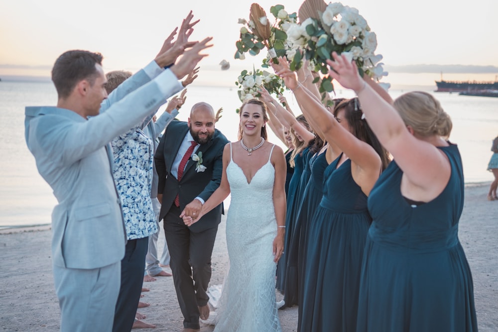 a bride and groom walking down the aisle