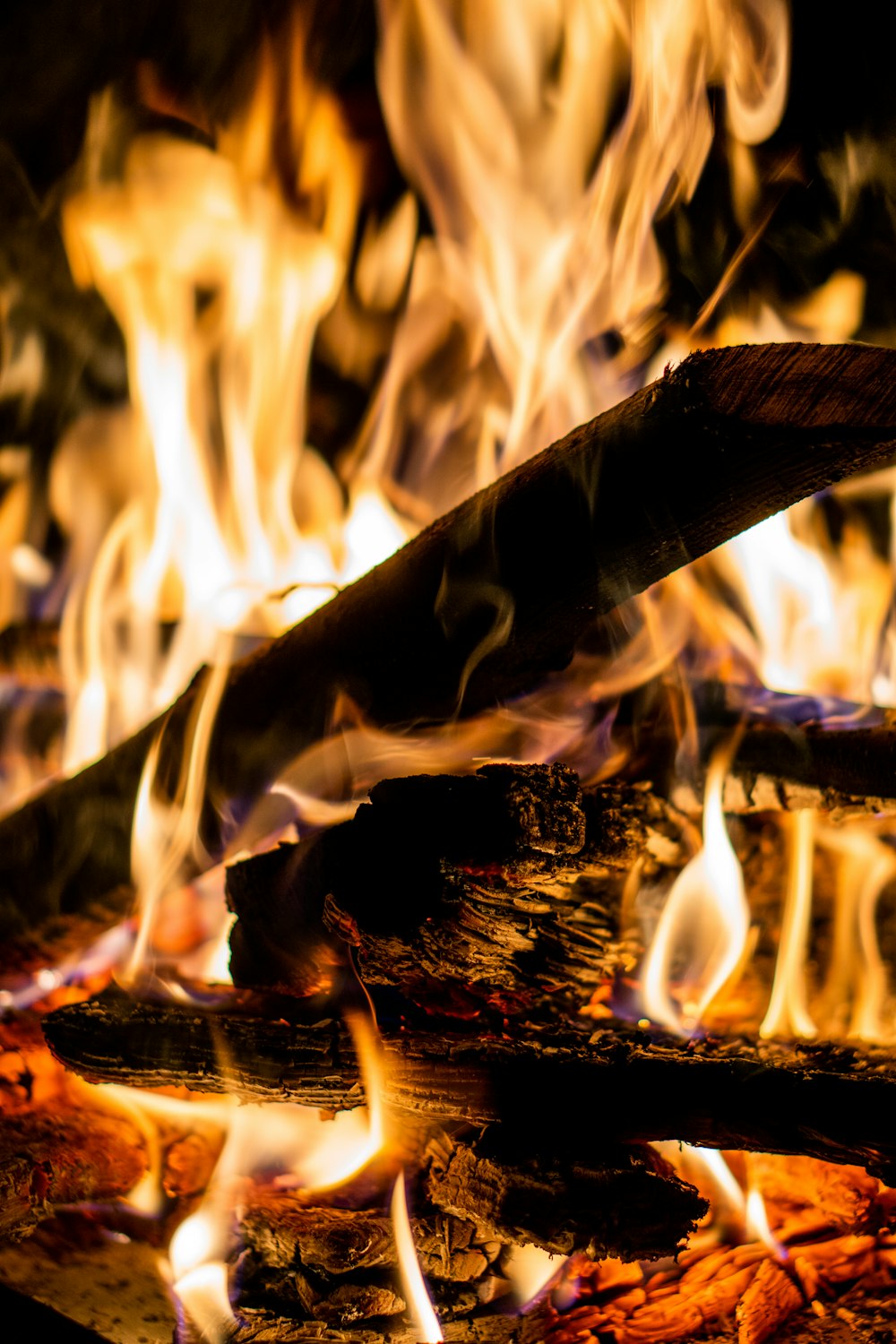 a close up of a fire burning in a fireplace