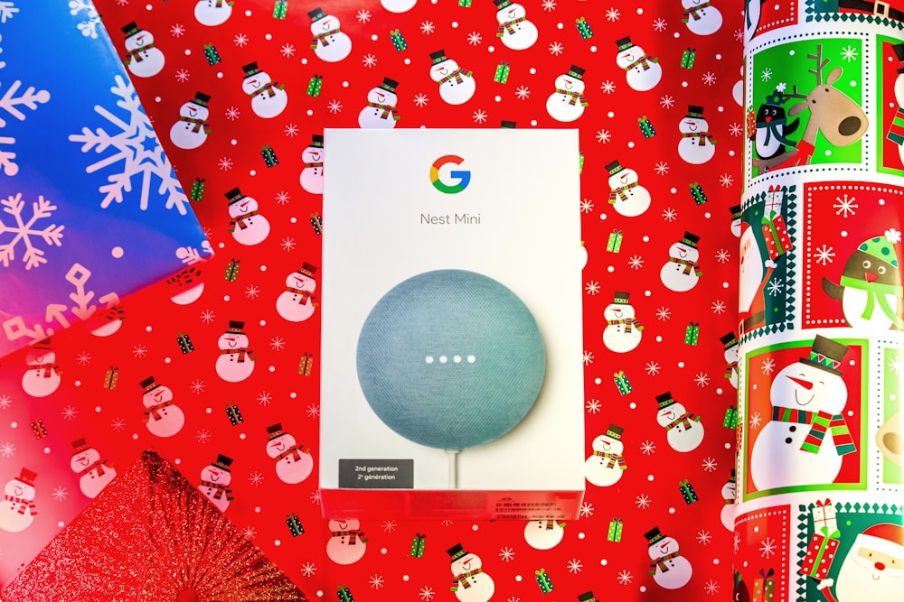a box of google home products on a red background
