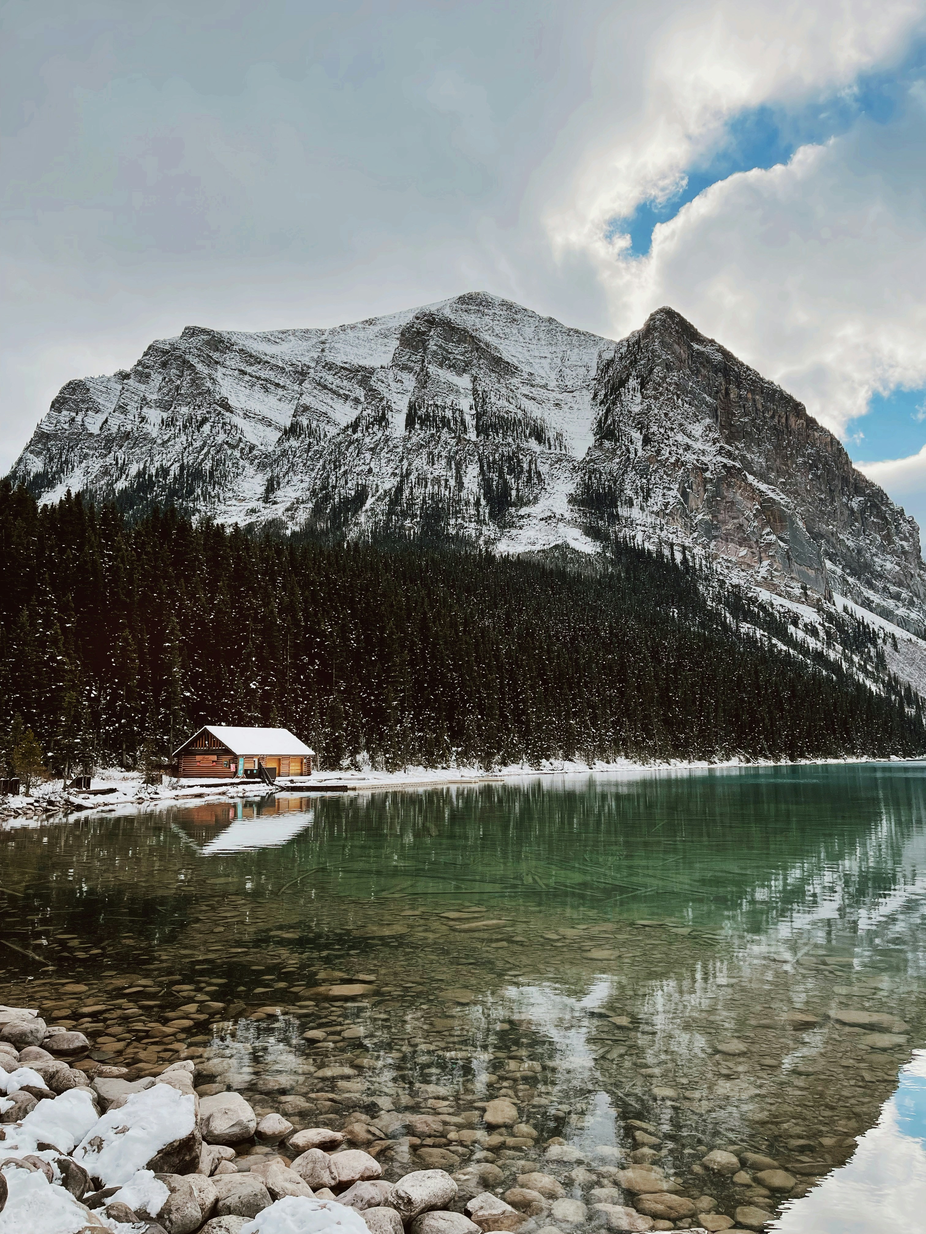 a lake with a mountain in the background