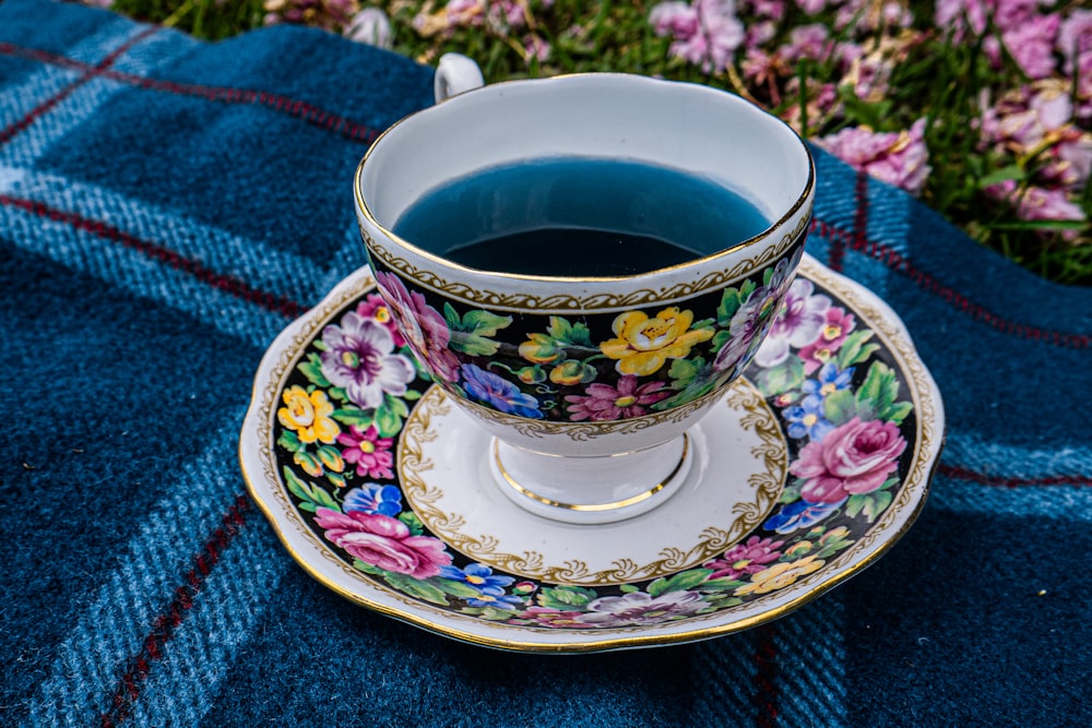 a cup of tea sitting on top of a saucer