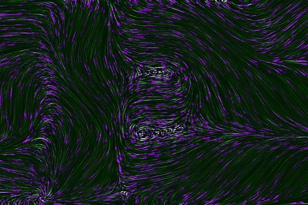 an abstract purple and black background with wavy lines