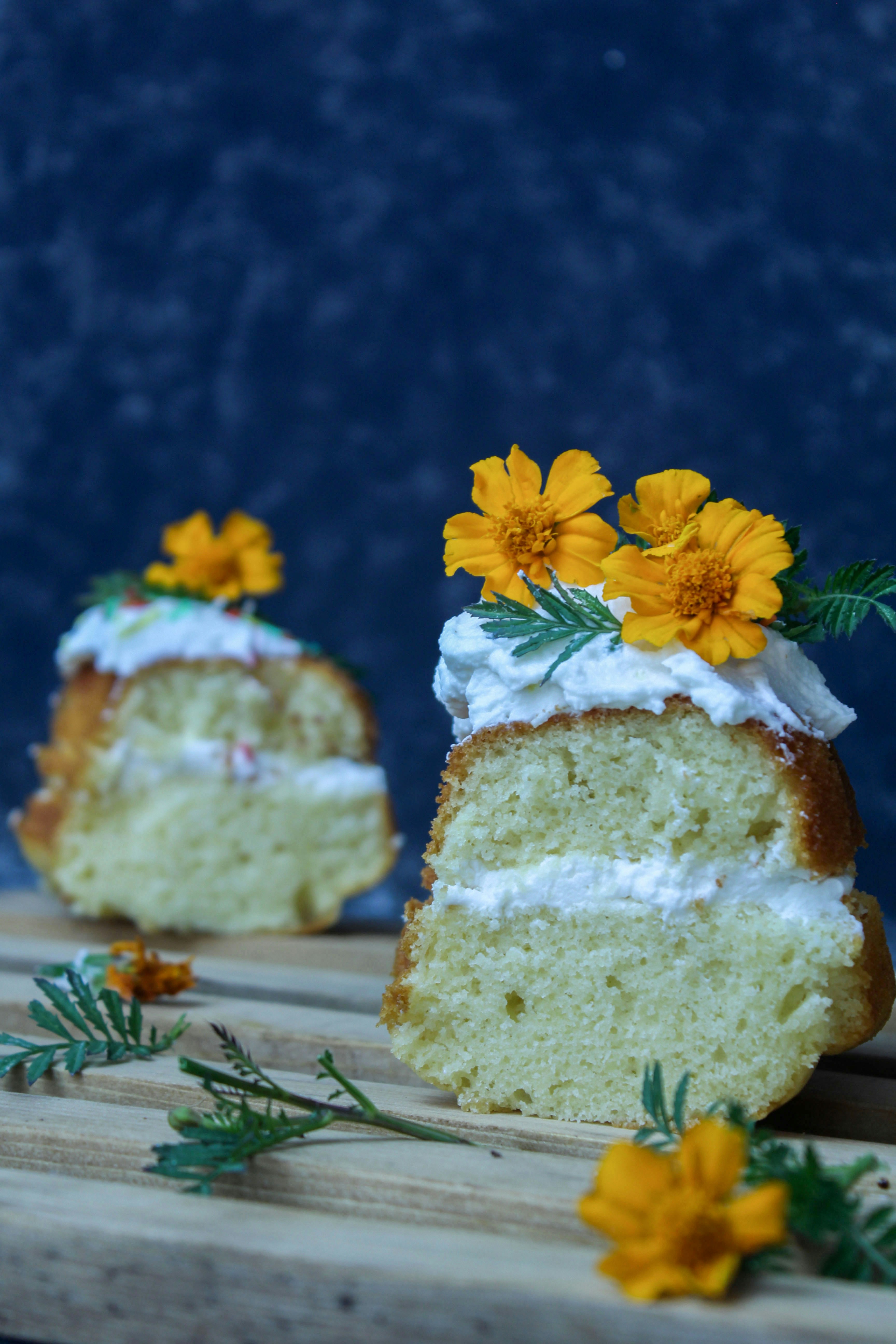 a piece of cake sitting on top of a wooden cutting board