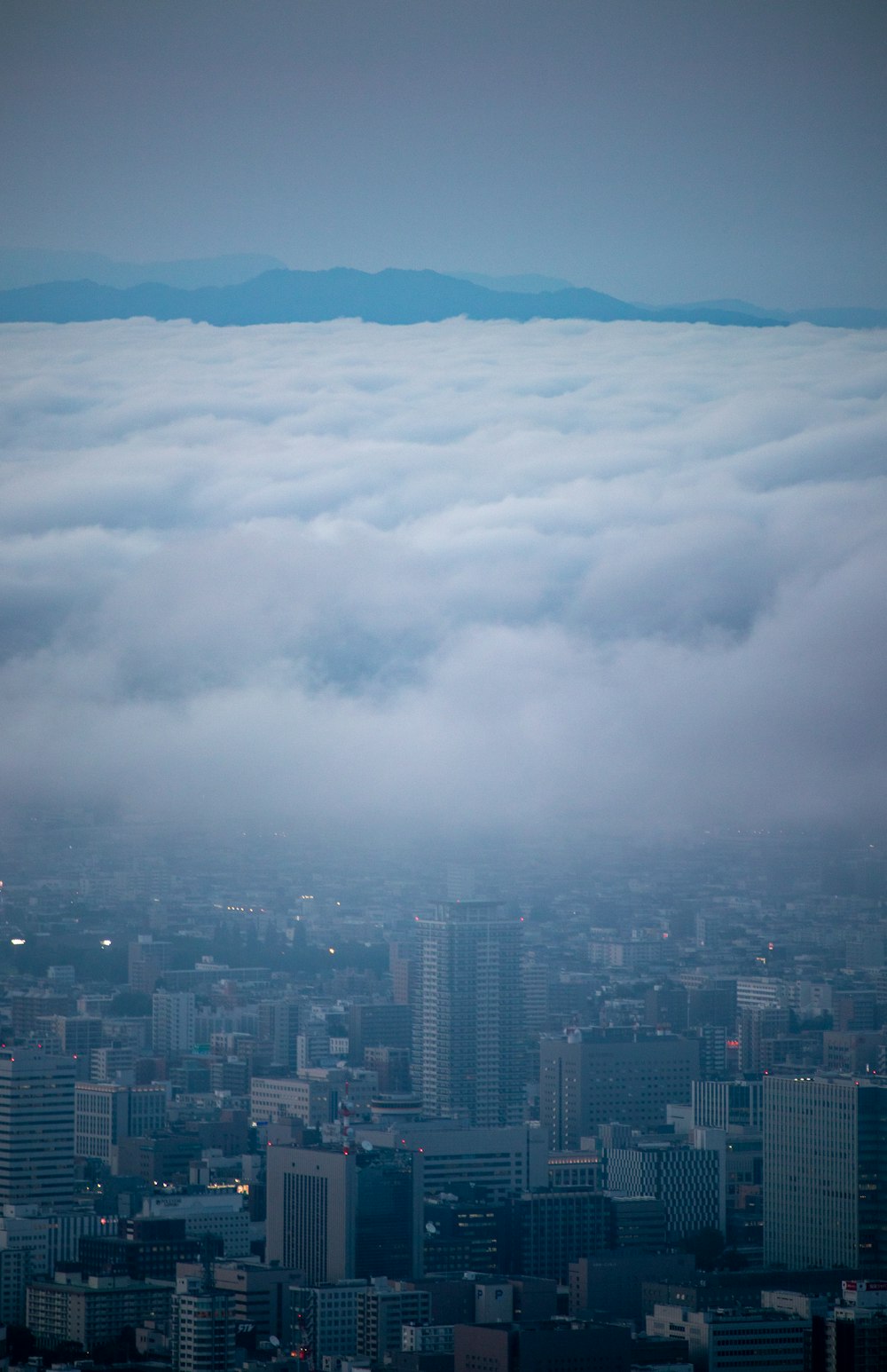 a view of a city with a lot of clouds