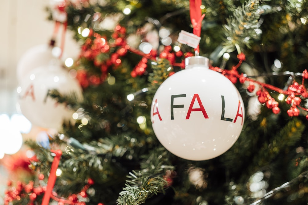 a close up of a christmas ornament on a tree