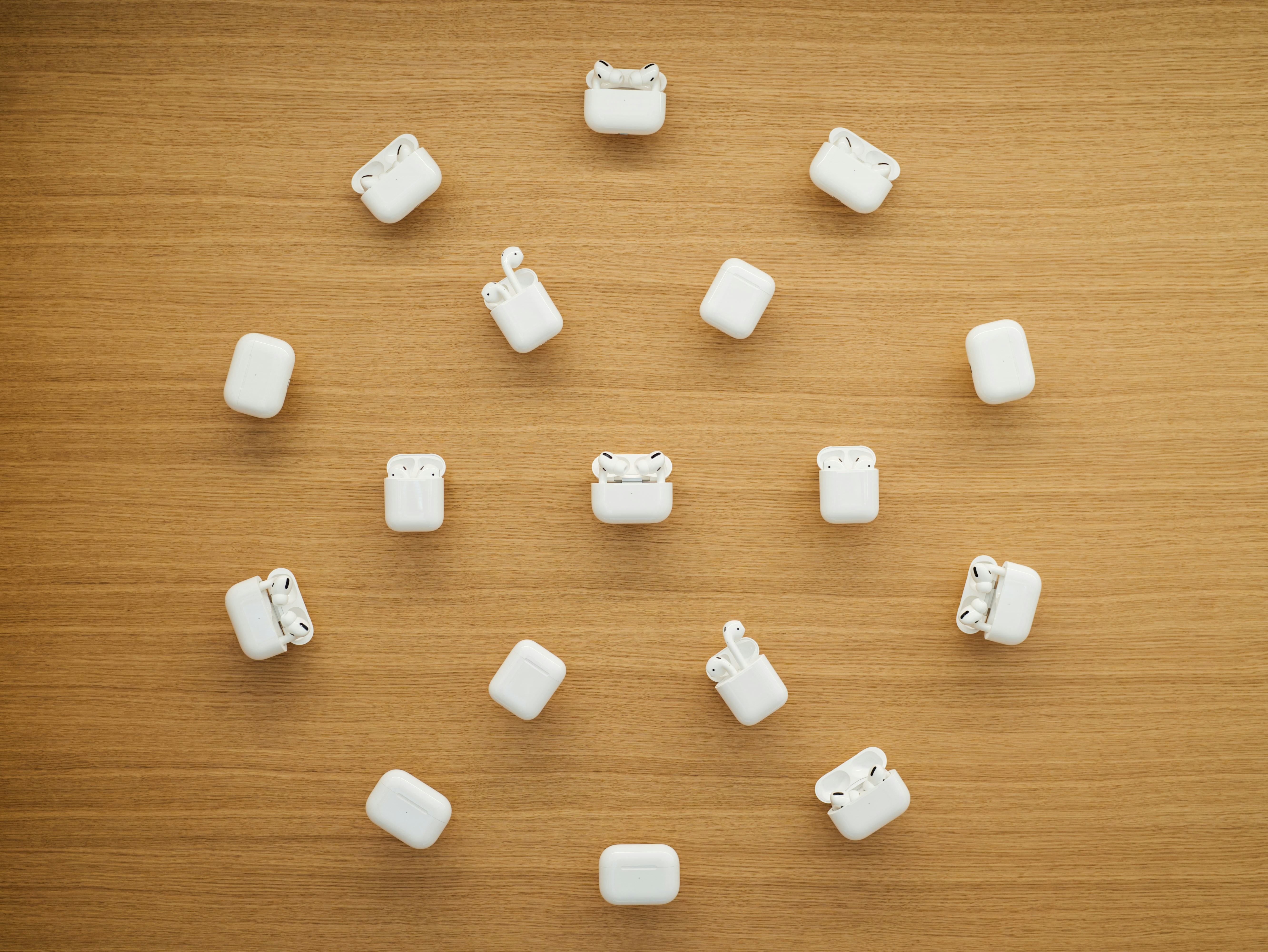 a group of white objects sitting on top of a wooden table