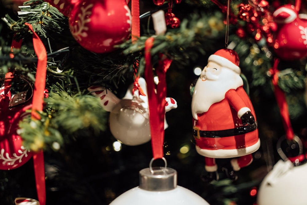 a close up of a christmas tree with ornaments