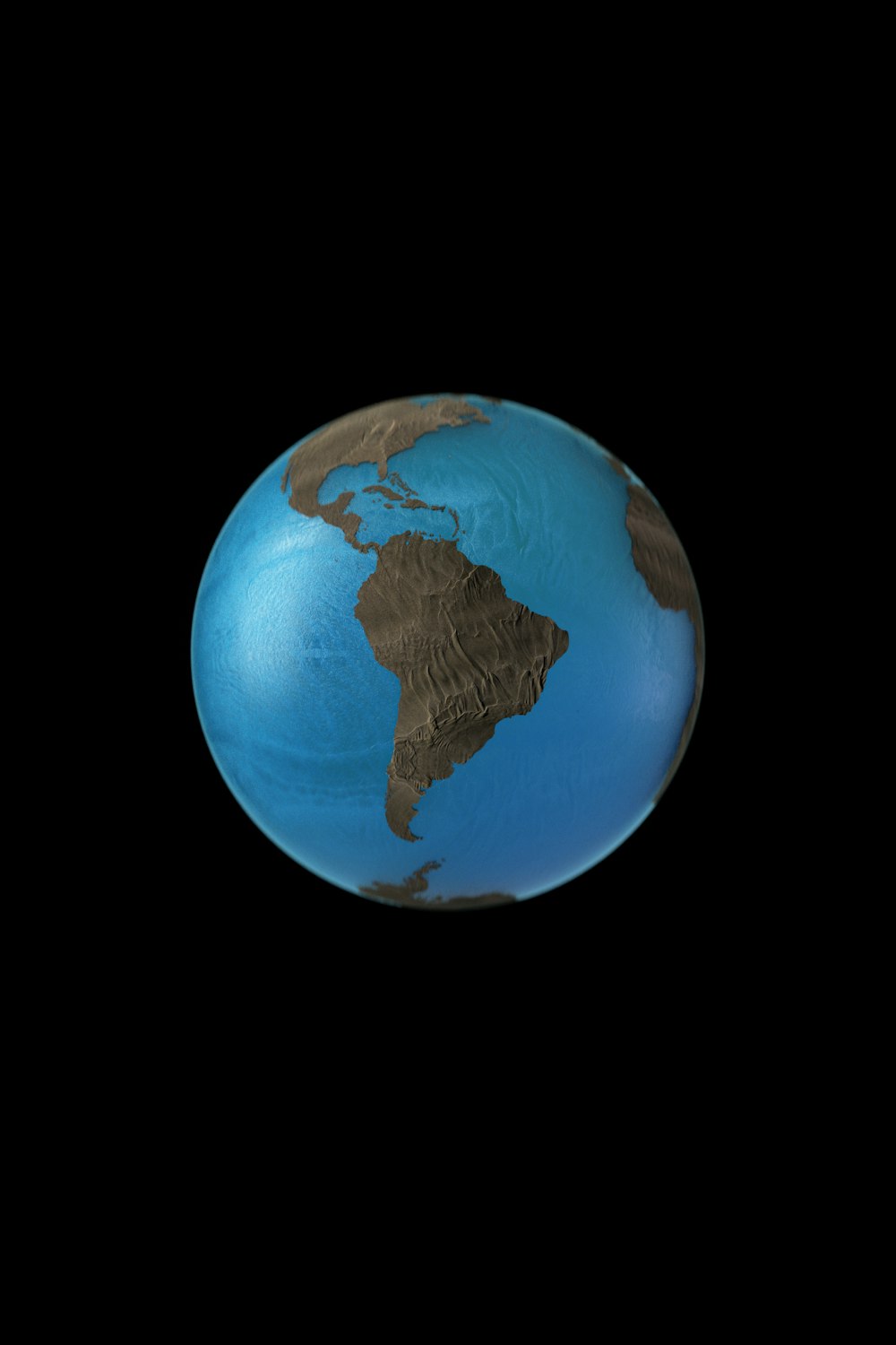a blue and brown earth globe on a black background