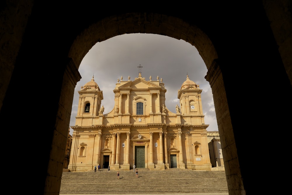 a view of a church through an archway