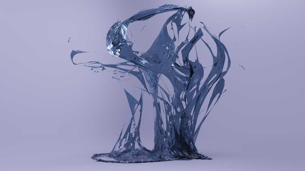 Una scultura fatta d'acqua su uno sfondo grigio