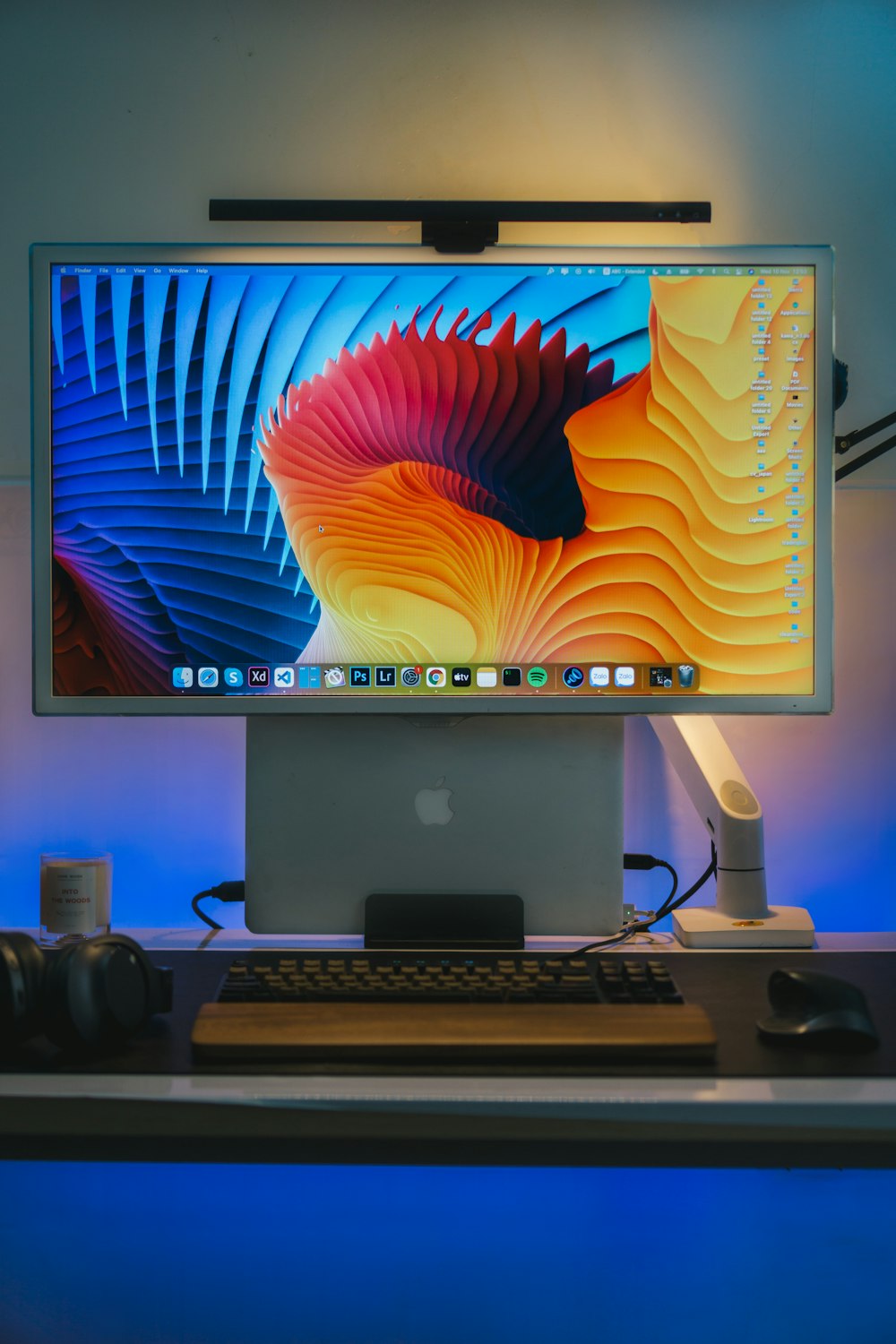 a computer monitor sitting on top of a desk