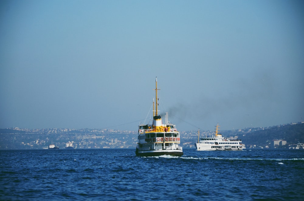 a large boat traveling across a large body of water